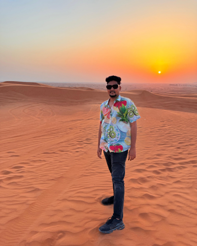Sunset over the desert landscape during a safari tour